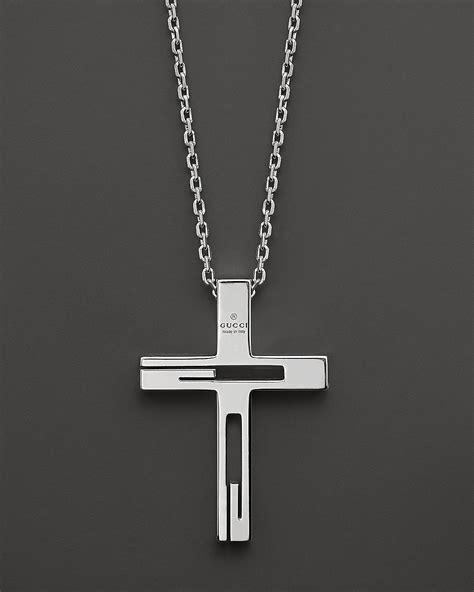 gucci silver cross necklace.